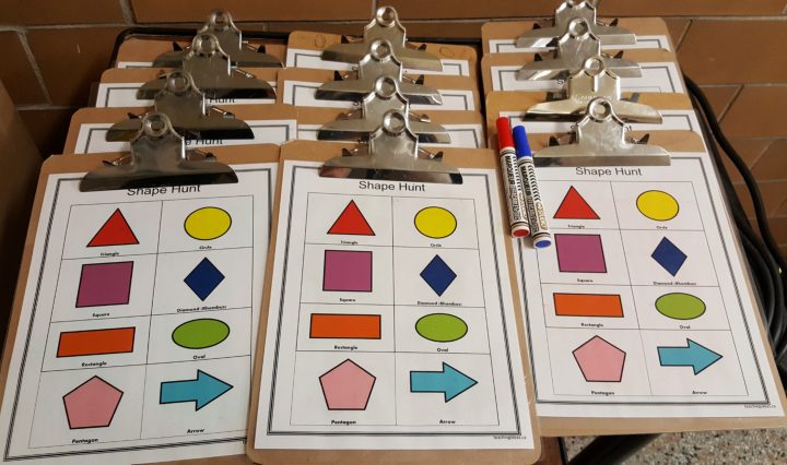 kindergarten worksheets for kids shows a bunch of worksheets on clipboards.