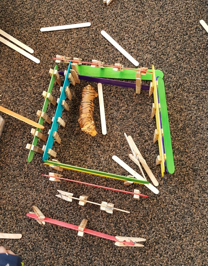 STEM for kids shows a birds eye view of a structure made from popsicle sticks.