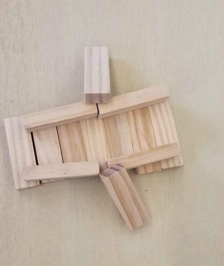 STEM shows a boat made from wooden building blocks.