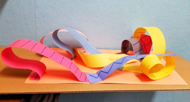 stem activity shows a roller coaster made from construction paper.