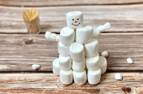 winter science shows a snowman made from marshmallow.