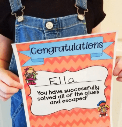 escape room certificate shows a child holding a completion certificate