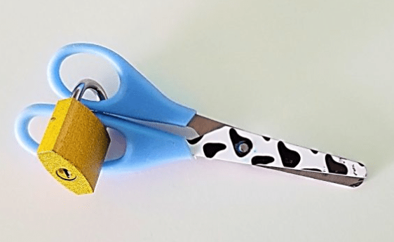 escape room ideas shows scissors that are locked