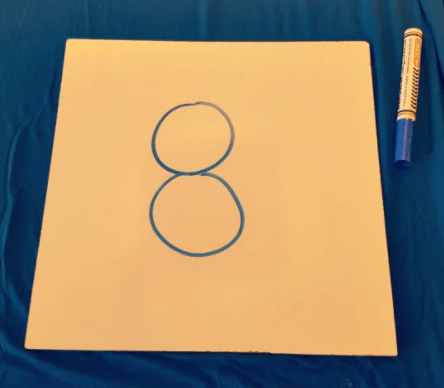 number talks shows a board with the number 8 on it.