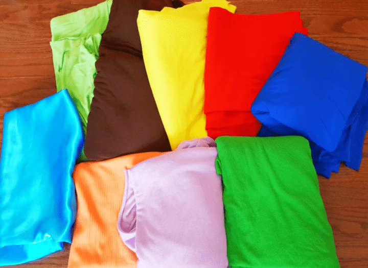 school supplies shows a rainbow of fabric sheets.