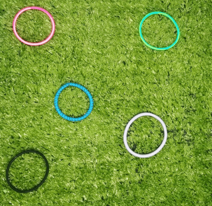 gym games for kindergarten green grass with 5 hoops.