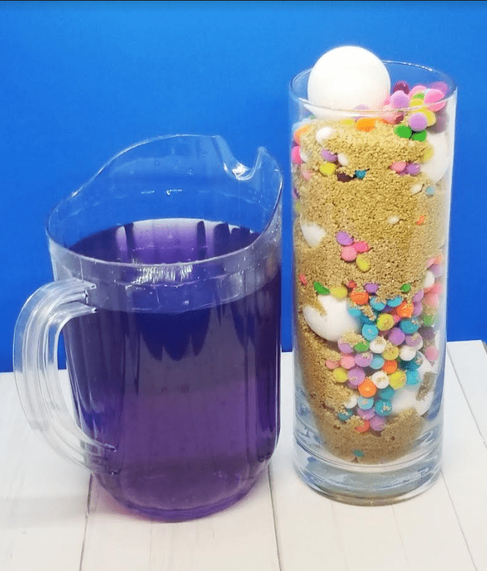 mental health lessons for kids shows a jar filled and a pitcher of purple liquid.