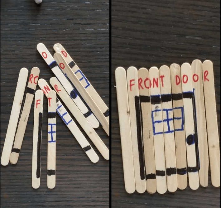 quick and easy escape room puzzles shows popsicle sticks that put together say front door.