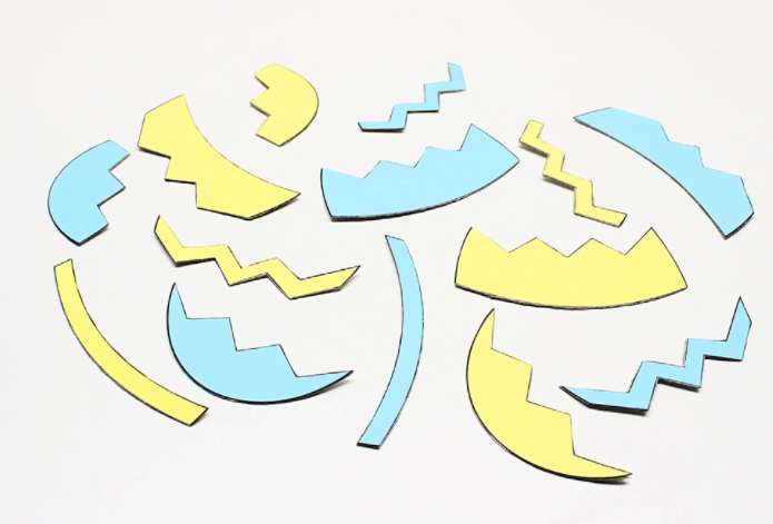 diy easter puzzle shows an egg puzzle cut up.