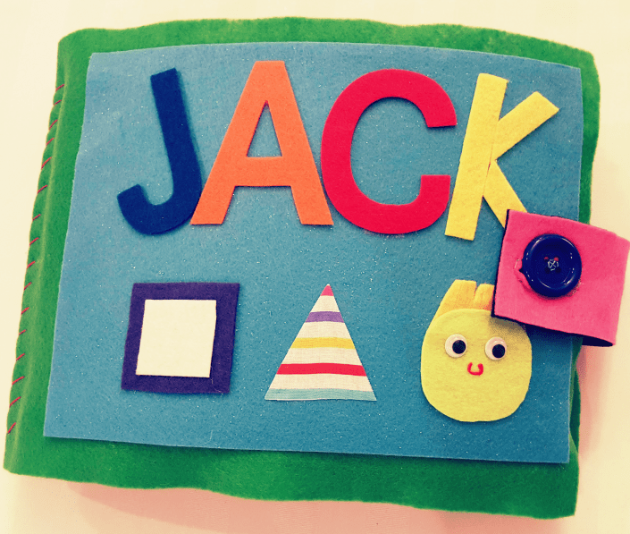 quiet book shows a felt book with the name jack on the front.