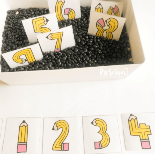 back to school math activity shows numbers made from pencils on printable cards.