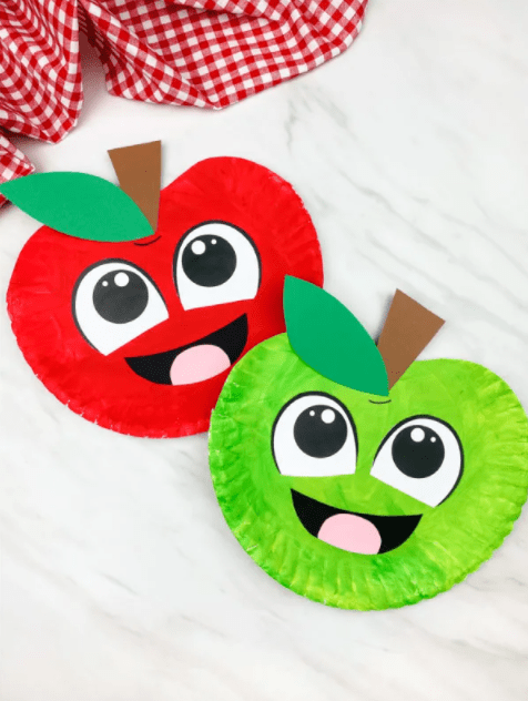 first day of school crafts shows two apples made from paper plates.