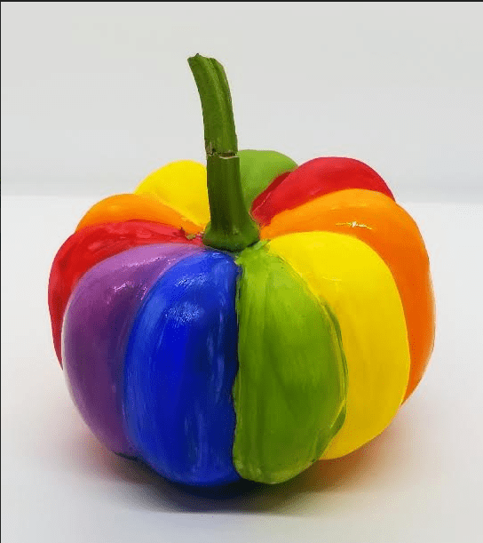 fall activity shows a pumpkin painted rainbow.