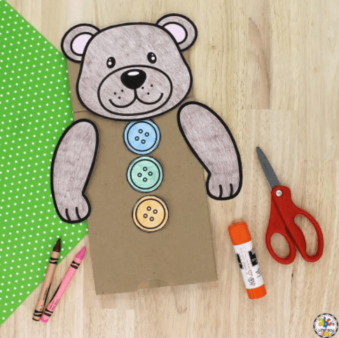 kindergarten math  worksheet shows a teddy bear craft with three buttons.