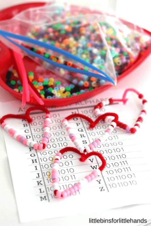 STEM a bag of beads and beaded hearts on pipe cleaners