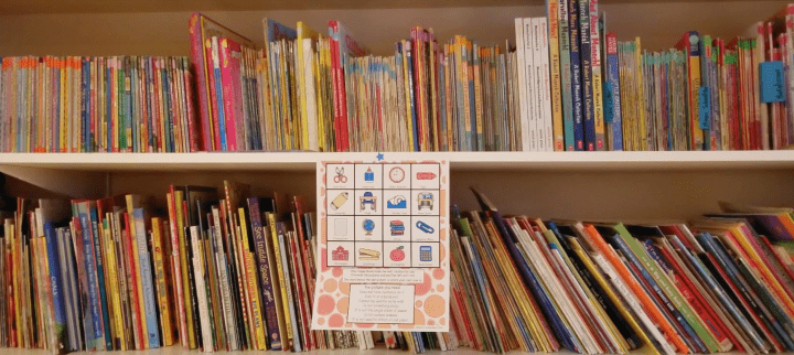 escape room for kids shows two shelves full of books.