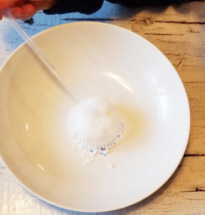 STEm activities for kids shows a white bowl and a fizzing white ball inside it.