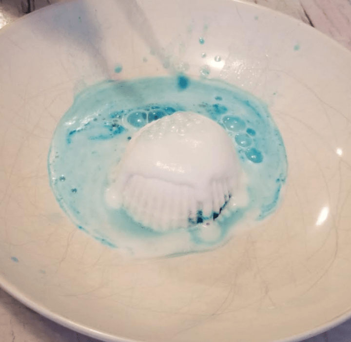 stem activity image is of a fizzing white puck and blue liquid all around.