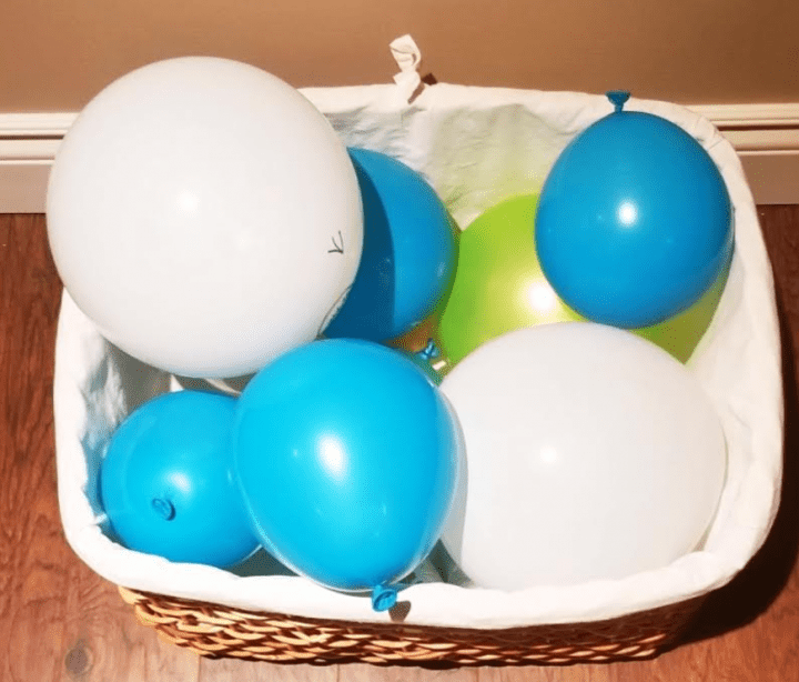 Make your own escape room with a basket full of balloons