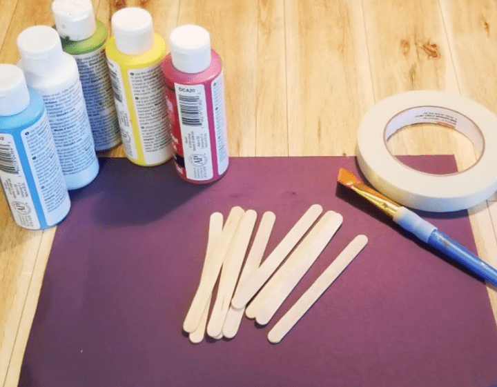 diy escape room shows paint and popsicle sticks