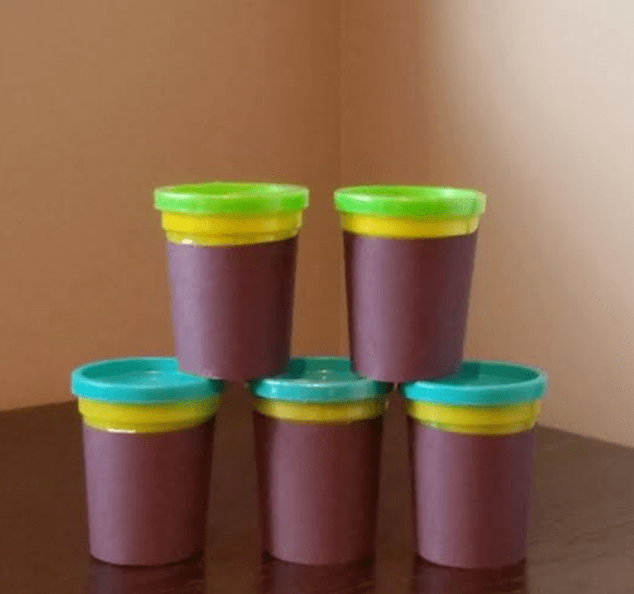 DIY escape room picture shows five containers of playdough