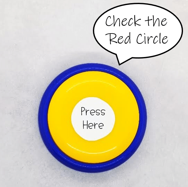 escape room for kids shows a yellow and blue circular button