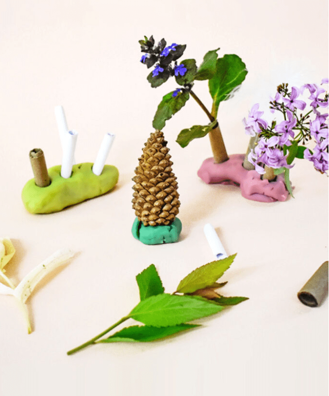 invitation to create a small world using items found in nature and play clay