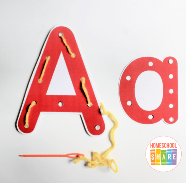 alphabet activity shows the capital and lower case a and yarn being laced through it.