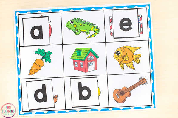 alphabet games shows a printed page with pictures and alphabet card on some of the pictures.