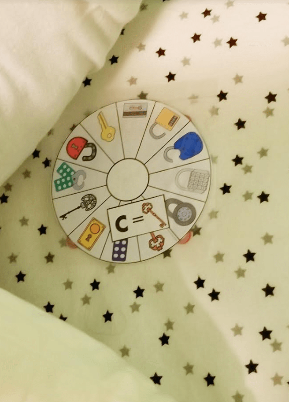 free printable escape room shows a puzzle on a bedsheet.