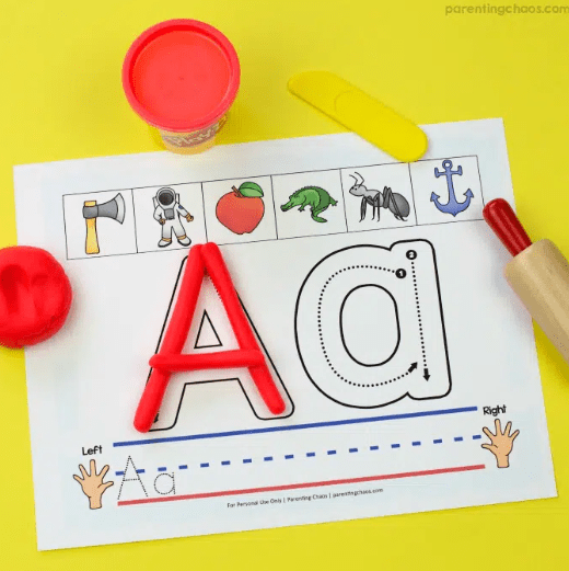 alphabet game shows the letter A mat with play dough forming the letter