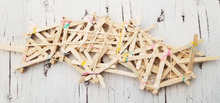 stem activities shows a view of popsicle sticks put together with elastics