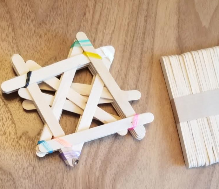 stem activities shows a popsicle stick creation