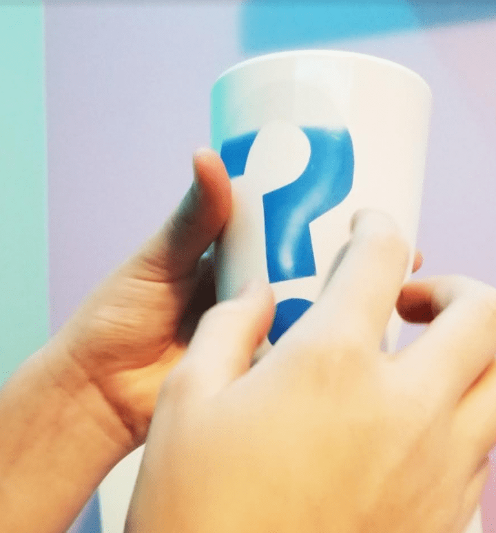 escape room ideas shows the mug with a turning blue question mark