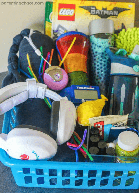mindfulness activities shows a basket with a variety of calming items like headphones