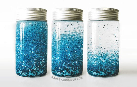 mindfulness play shows three jars filled with sparkles