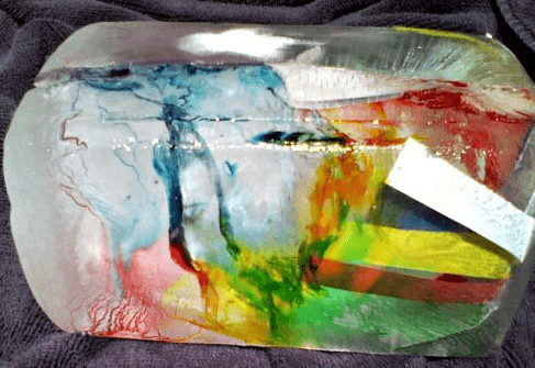 sensory activity shows a block of ice with paint dripping on it