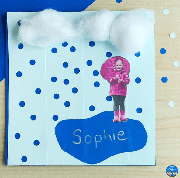paper crafts and activities shows a paper with holes punched out and a picture of a child with an umbrella.