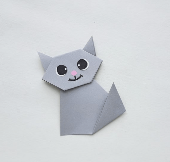 origami craft shows a cat made from paper..