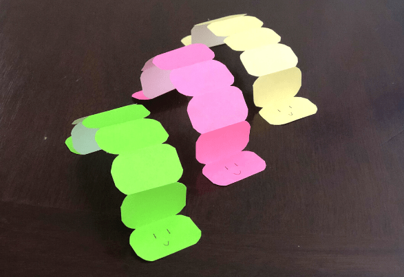caterpillar game shows three paper caterpillar crafts.
