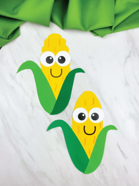 fall crafts for kids shows two corn crafts.