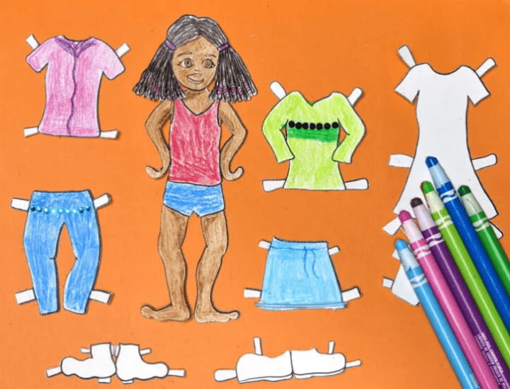 paper crafts and activities shows a paper doll and colored clothes.