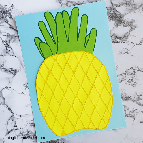 paper crafts and activities shows a paper pineapple.