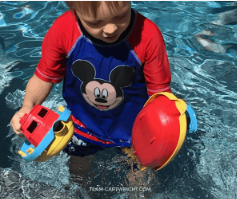 summer stem activity shows a child in a pool 
