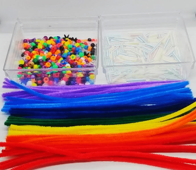 stem for kids shows a picture of beads, pipe cleaners and cut straws.