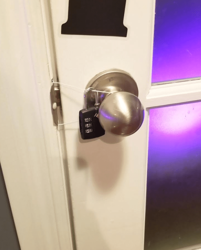 DIY escape room shows a door knob that is attached by the gate quickly.