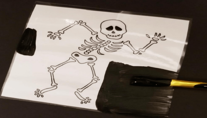 Fall escape room shows a skeleton that has been painted around it a bit.
