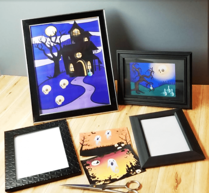 make a halloween escape room shows picture frames with halloween pictures.