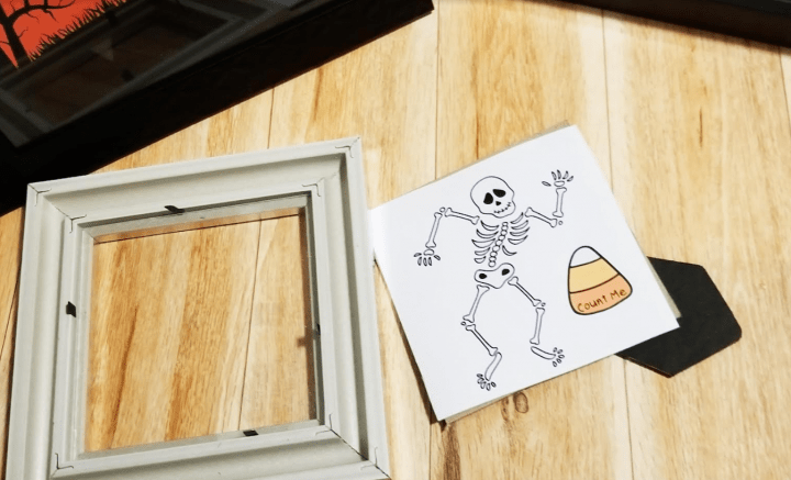 Make a Halloween Escape Room shows a skeleton image and frame near the fridge.