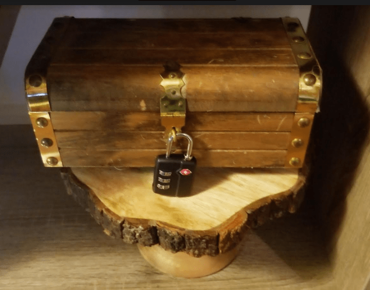 halloween escape room shows a locked box.